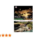 Guida turistica per visitare la Maremma Toscana, con immagini di borghi illuminati e cascate termali.