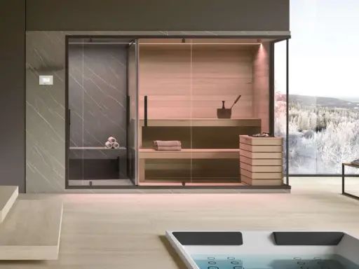Moderna spa per famiglie con sauna in legno, doccia e vista panoramica su un paesaggio innevato.